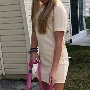 Pastel yellow T-shirt dress